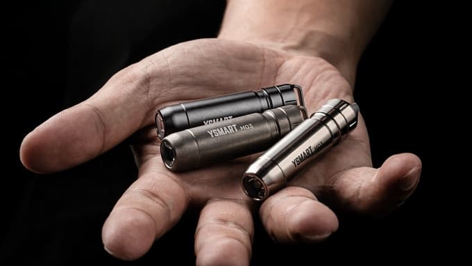 The YSMART MQ3, pictured here in matte black aluminum, stonewashed titanium and polished titanium (top to bottom)