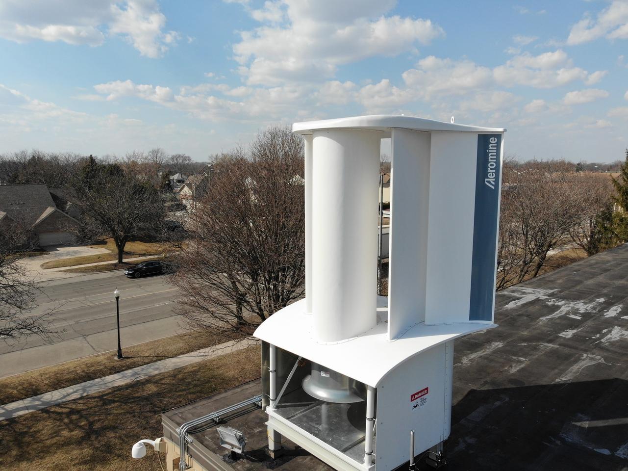 Aeromine Wind-Harvesting Unit, installed as a pilot trial on top of BASF's manufacturing facilities in Wyandotte, Michigan. We expect the large box at the bottom will disappear in commercial applications, with the air intake and turbine running below the roof line