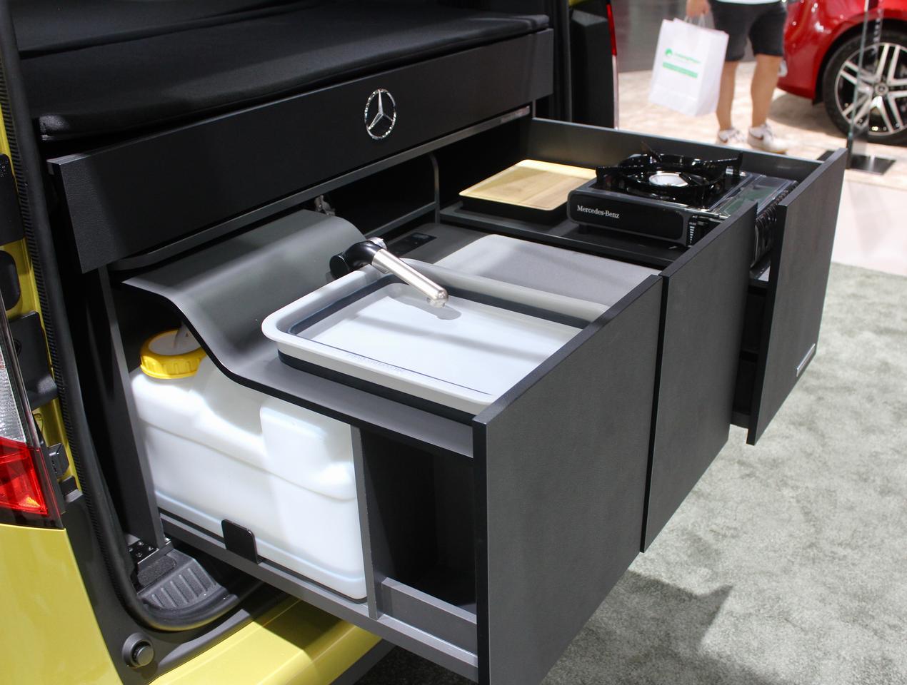 Sliding out the sink, fridge and cooking modules of the T-Class Marco Polo kitchen