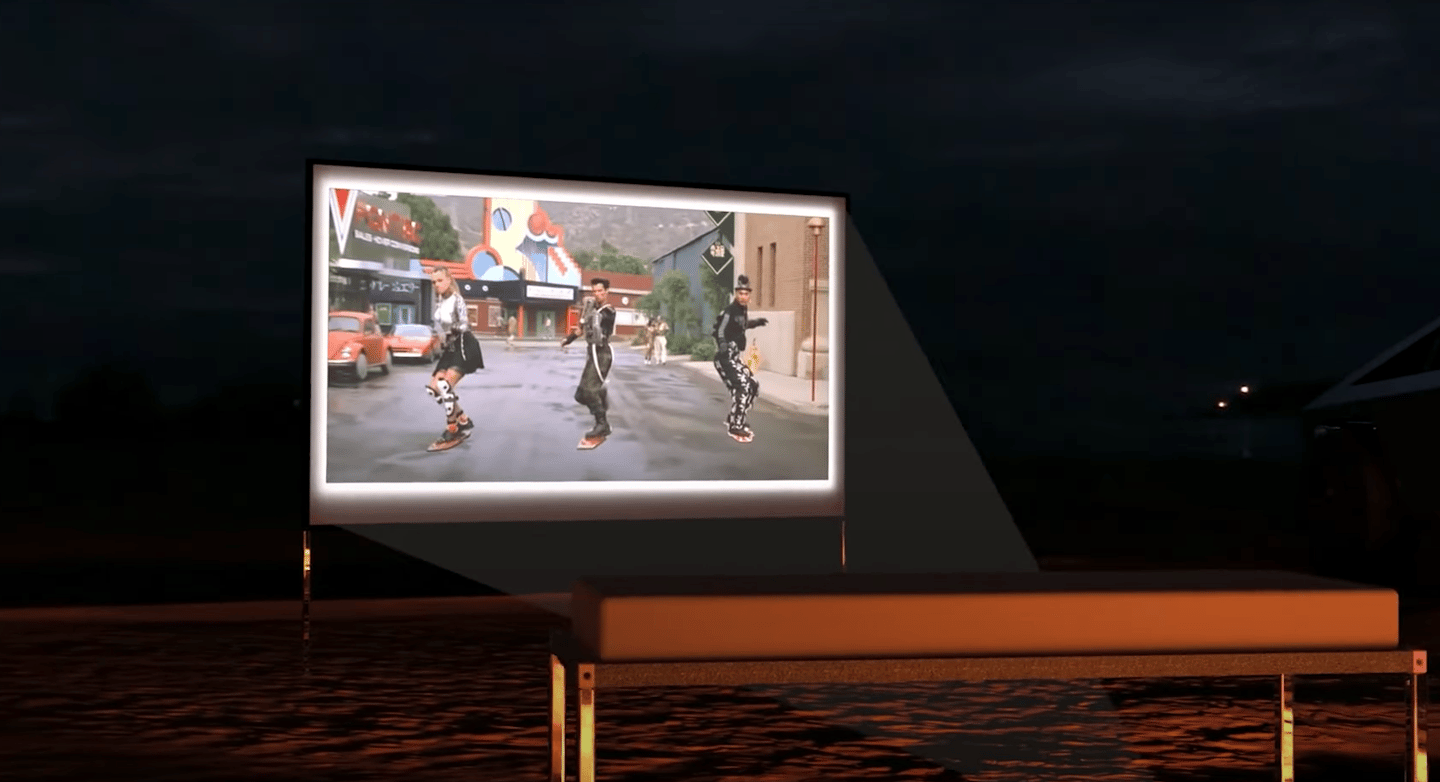 The bed platform removes to become the dining table surface and a movie screen