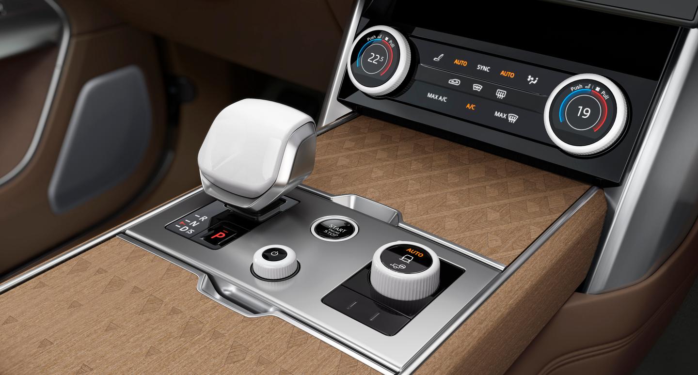 Beautiful wood, metal, and other materials are found throughout the new Range Rover's interior