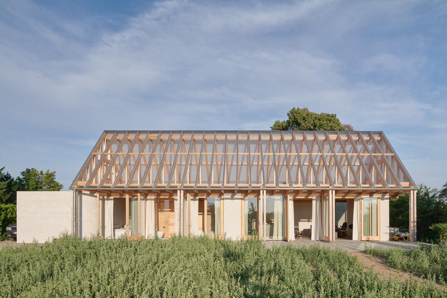 Not your average glass house: Das Glashaus features a brick first floor and a transparent roof