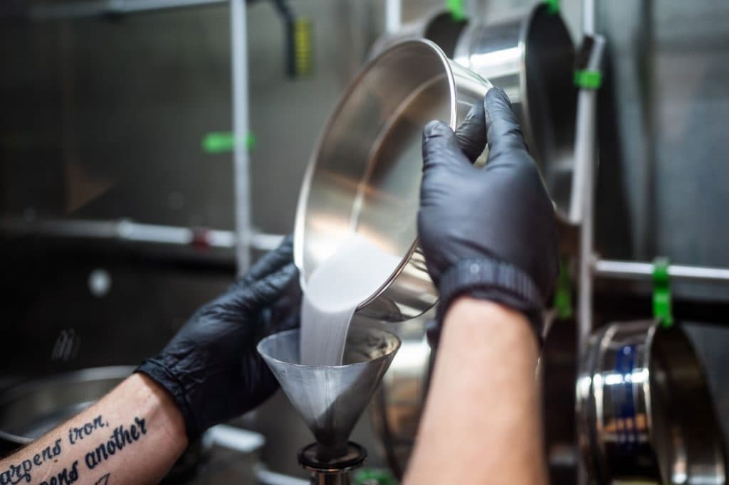 Raw materials are put separately into the Laser Engineered Net Shaping additive manufacture machine