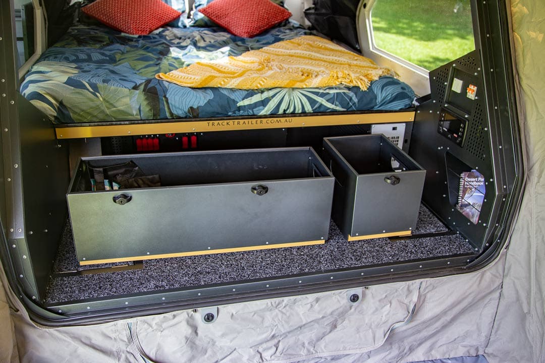 Under-bed storage drawers remove for easy loading/unloading before sliding and locking back in place