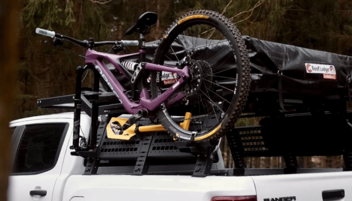 Days on Tracks' simple bike tray mount system works with its bed rack for low-profile bicycle