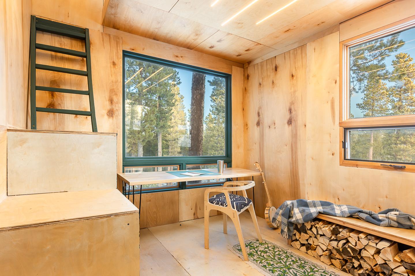 The Magnolia Eco-Cabin's interior is very simple and is taken up by two rooms which are spread over two floors