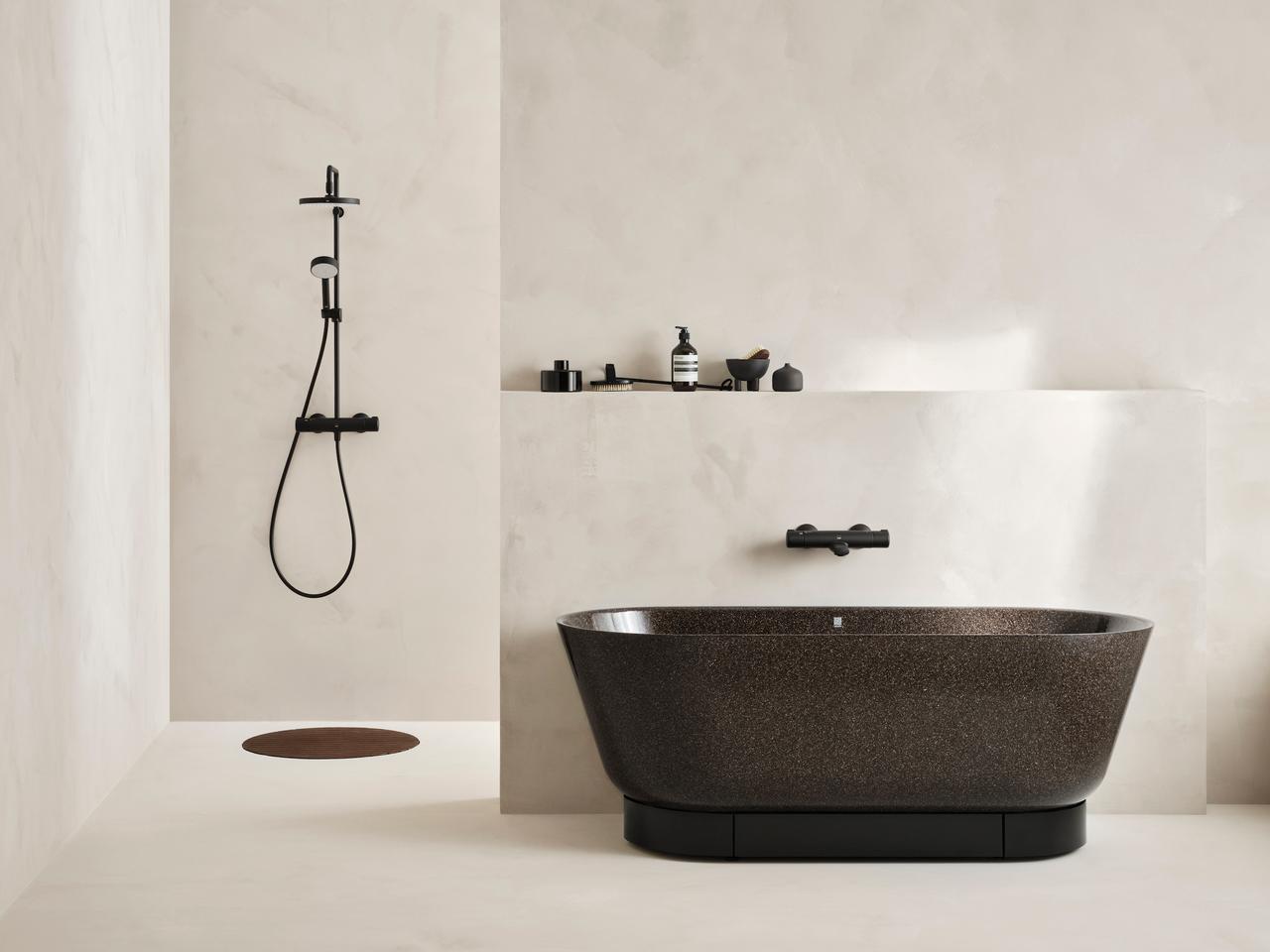 Woodio manufactures different types of composite wood bathroom ware, including a bathtub and a sink
