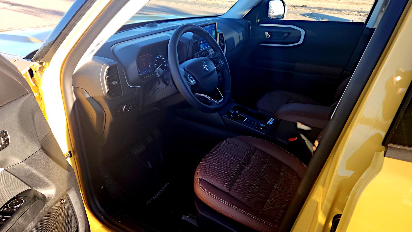 Plaid cloth surrounded by faux leather mark the Heritage Limited model from other Bronco Sport models' interiors