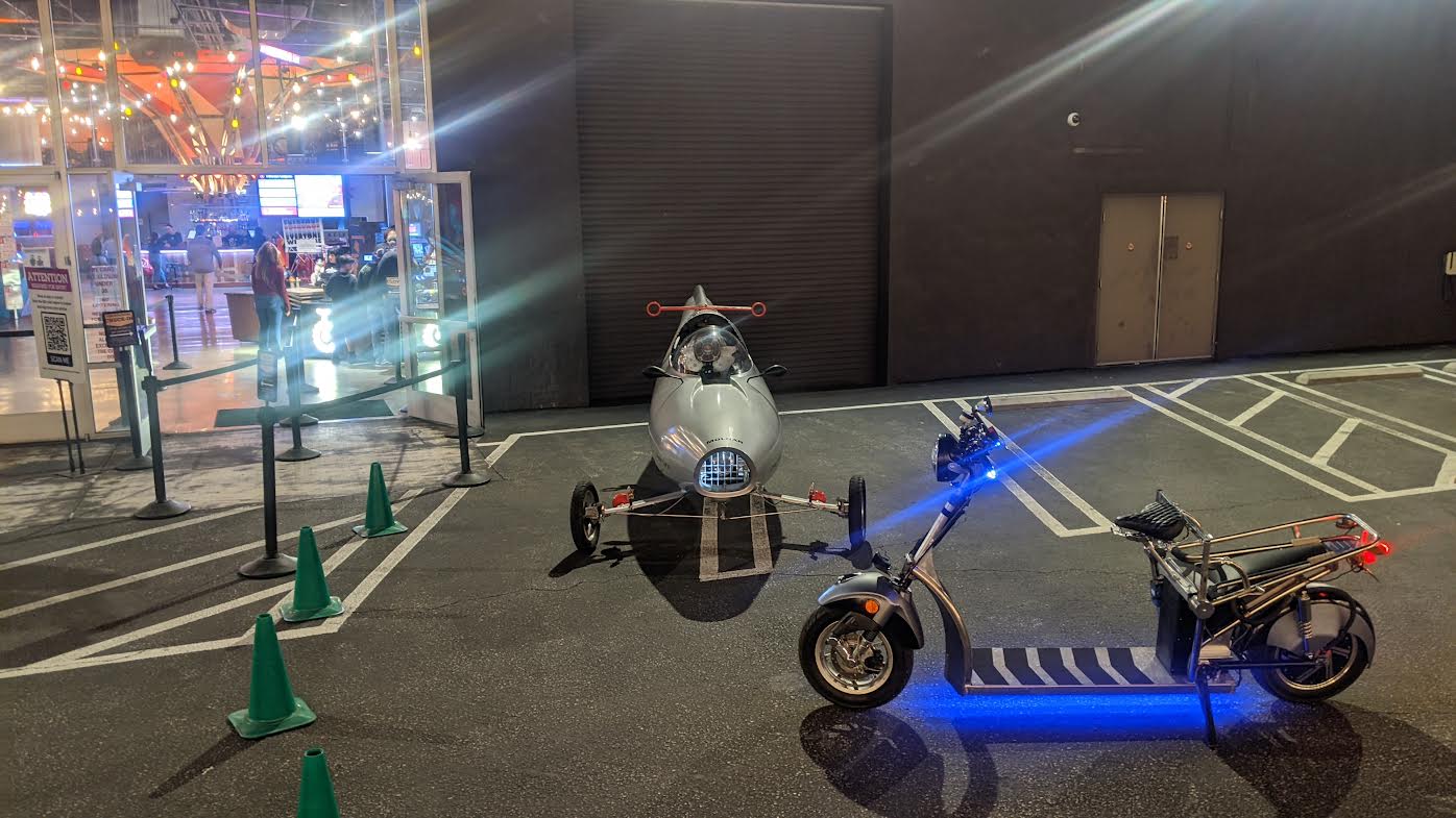 The Surfcycle with the rolling Streetwing prototype. And neons. Very important, neons.