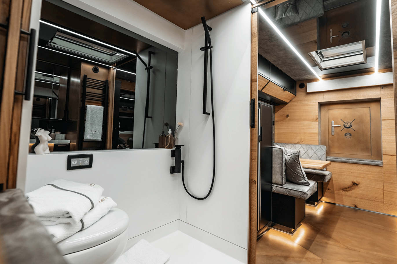 SOD splits the bathroom into a long shower/toilet compartment combo and a separate sink area