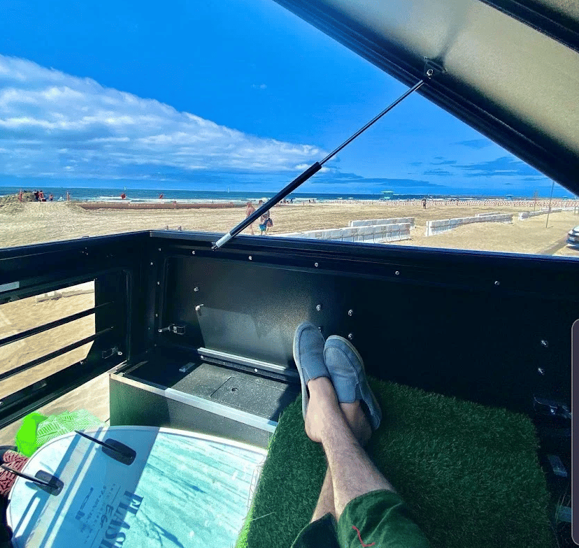 Besides offering oversized load capabilities, the Gaia pop-up roof helps create a breezy lounge when using it as a camper shell