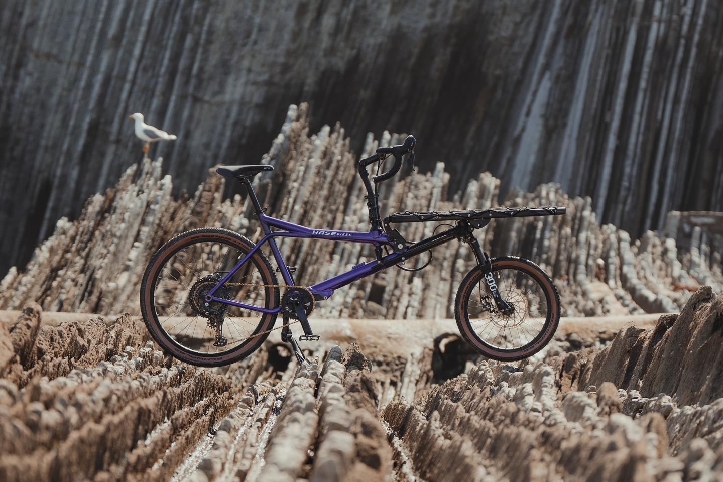 The Gravit Dust boasts a telescoping frame, Shimano Deore gears, mechanical disc brakes, a suspension fork, a 20-inch front wheel and a 26-inch rear wheel