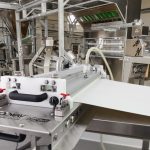 Read more about the article Automation of Cleaning and Sanitizing Conveyor Belts is a Game Changer