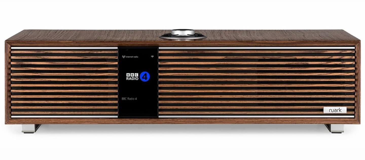 The walnut grille masks the R410's quad-driver sound system, while also being home to a 4-inch color display with auto dimming