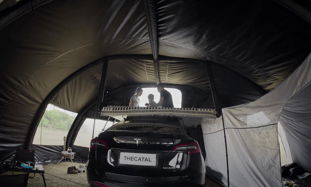 The large inflatable rooftop mattress creates a second-story camping experience