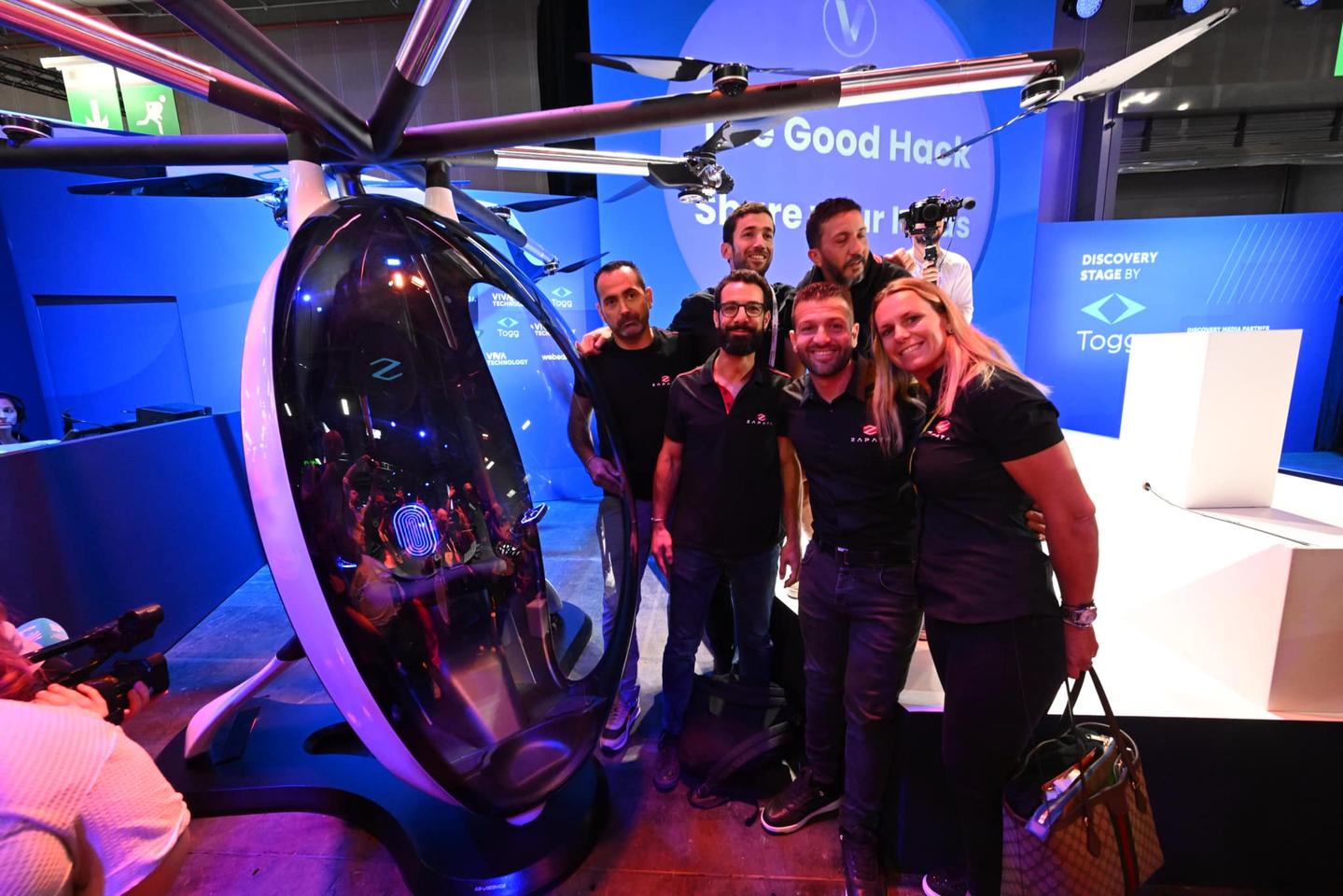 Franky Zapata, second from the right in the front row, with team members presented the AirScooter prototype at VivaTech