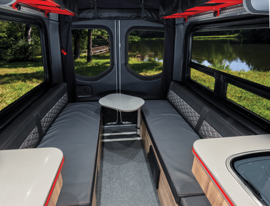 The rear lounge features two benches and a removable swivel table