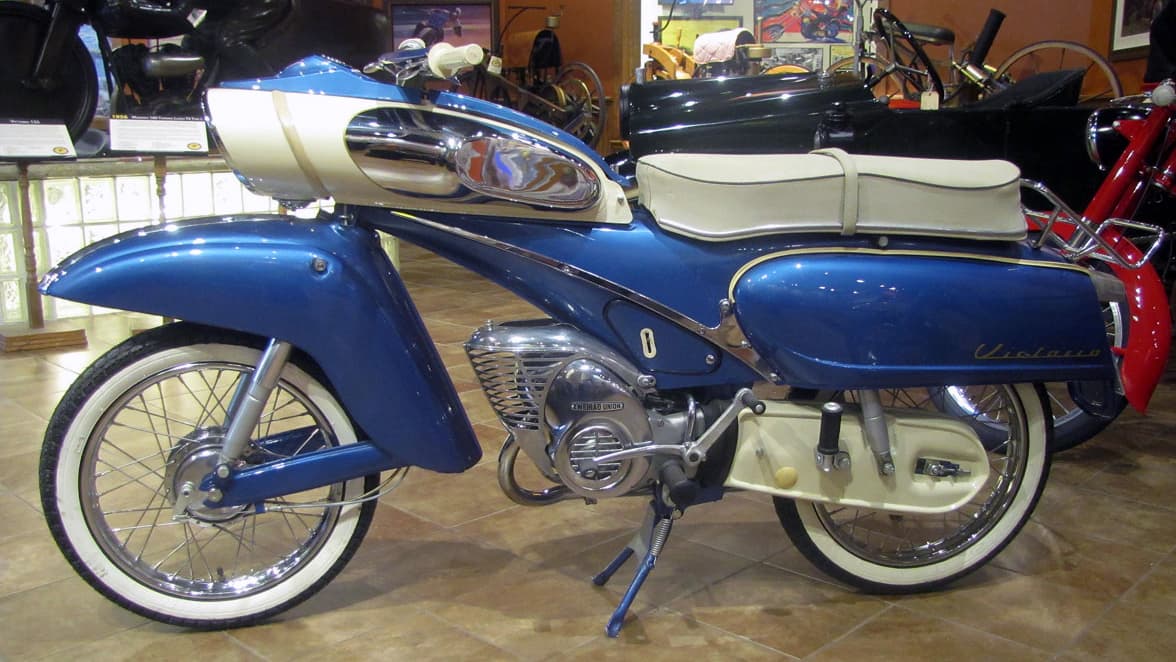 The Tin Banana came with just one 50cc engine size, but two quite different power options - the lesser 115 model had just 2 horsepower, and the 155 model had double that power. It was also sold under three different brand names as the DKW Hummel, the Express Kavalier, and the Victoria Spoetnik. A 50cc motorcycle that would struggle to pull the skin off a rice pudding for $19,500 might not seem like much of a bargain, but it is. Read on to find out why.