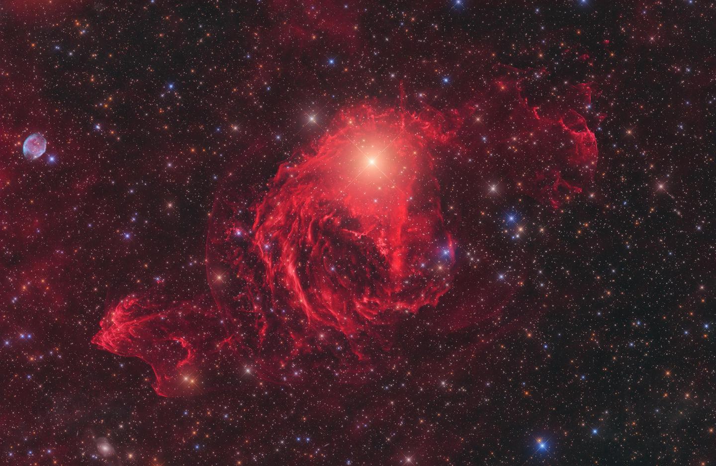 Stars & Nebulae, Winner. "New Class of Galactic Nebulae Around the Star YY Hya"