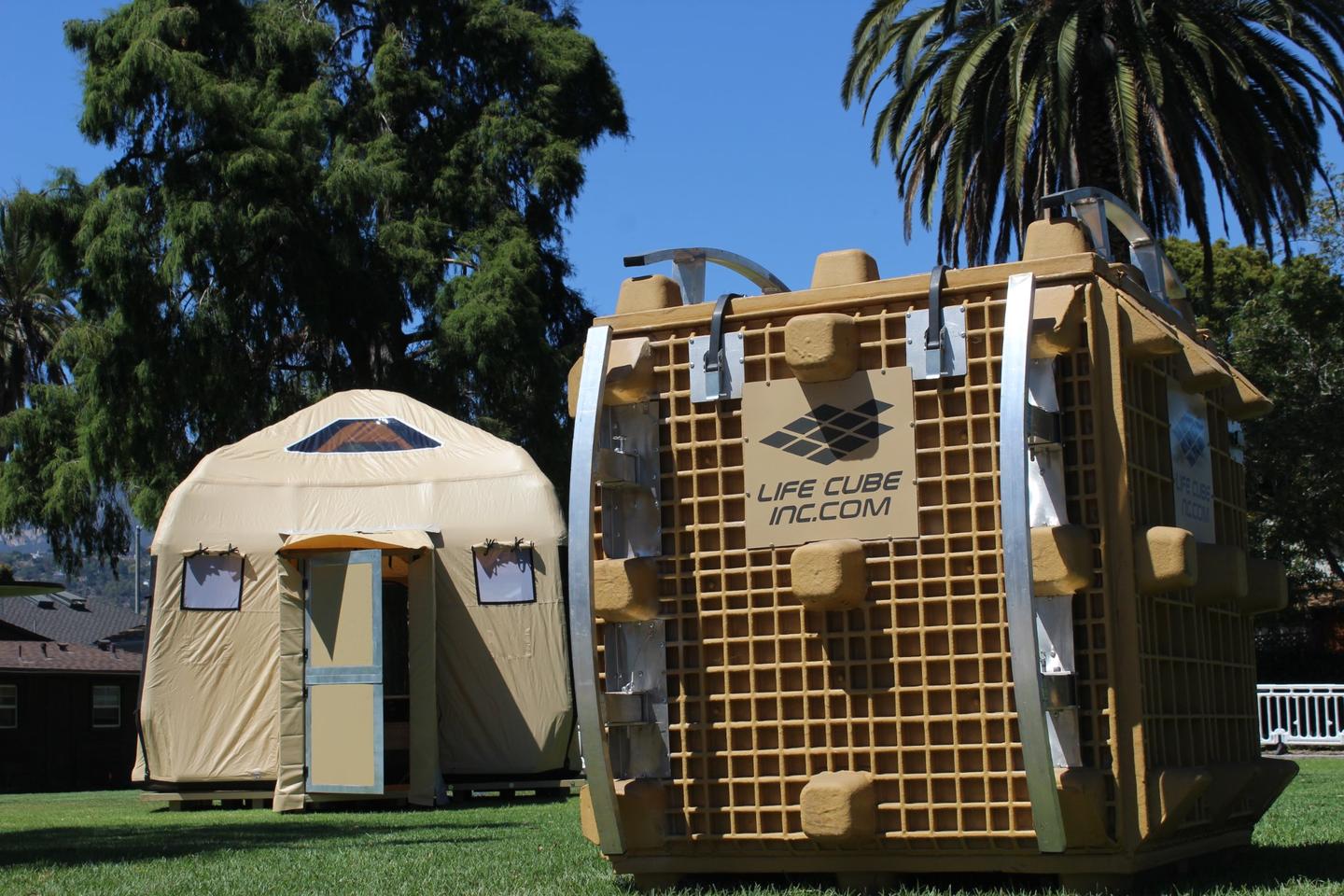 The Life Cube LC-12 emergency shelter, in pitched and packaged form
