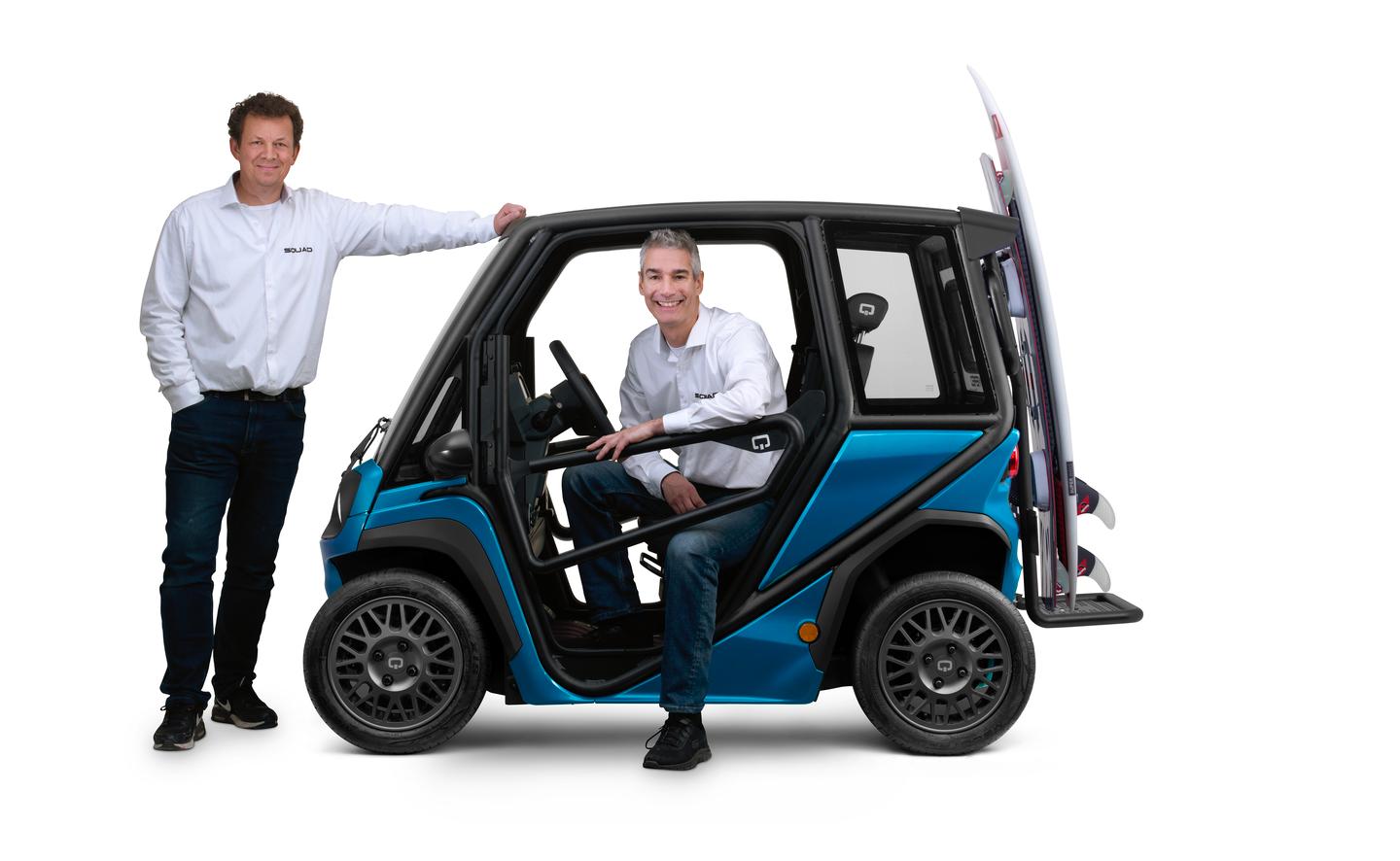 Squad Mobility founders Robert Hoevers and Chris Klok with the special edition Solar Buggy microEV