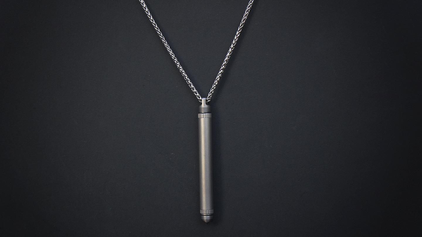 The Mantis Pen can be worn as a necklace