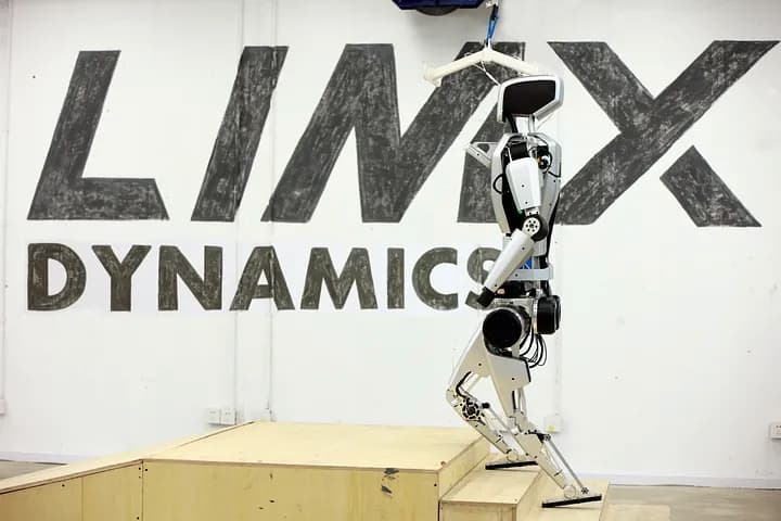 The robot climbed a set of stairs before descending a 15-degree slope