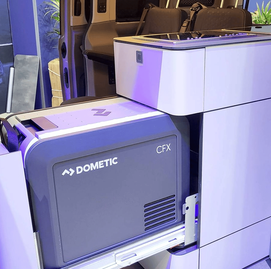 The Dometic CFX compressor fridge slides out from the end of the kitchen block for indoor/outdoor access