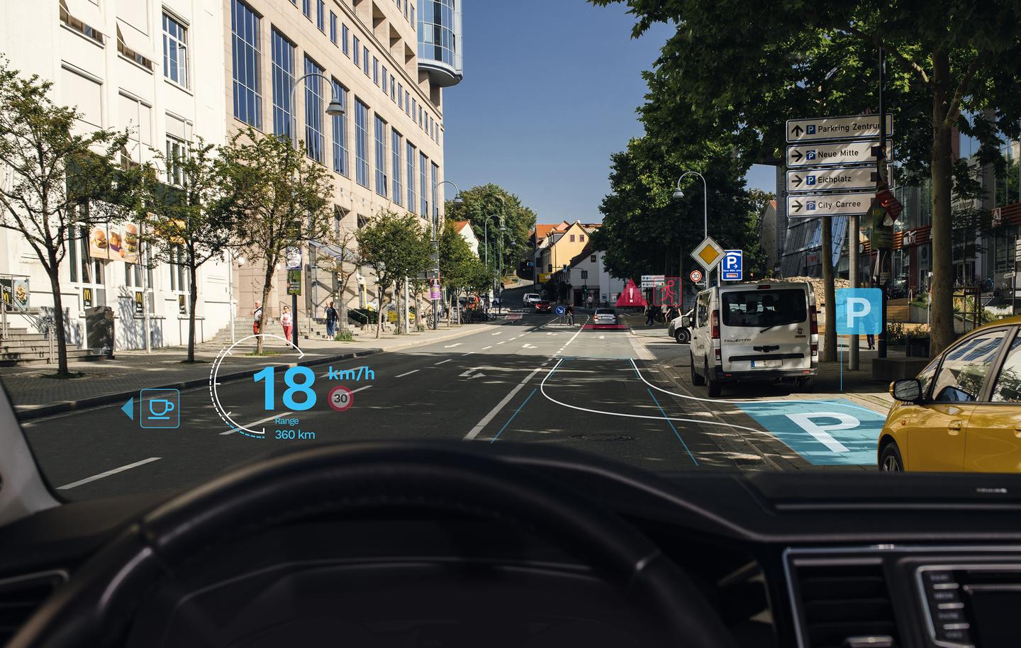 The micro-optic layer can be applied to vehicle windshields, to serve as a head-up display