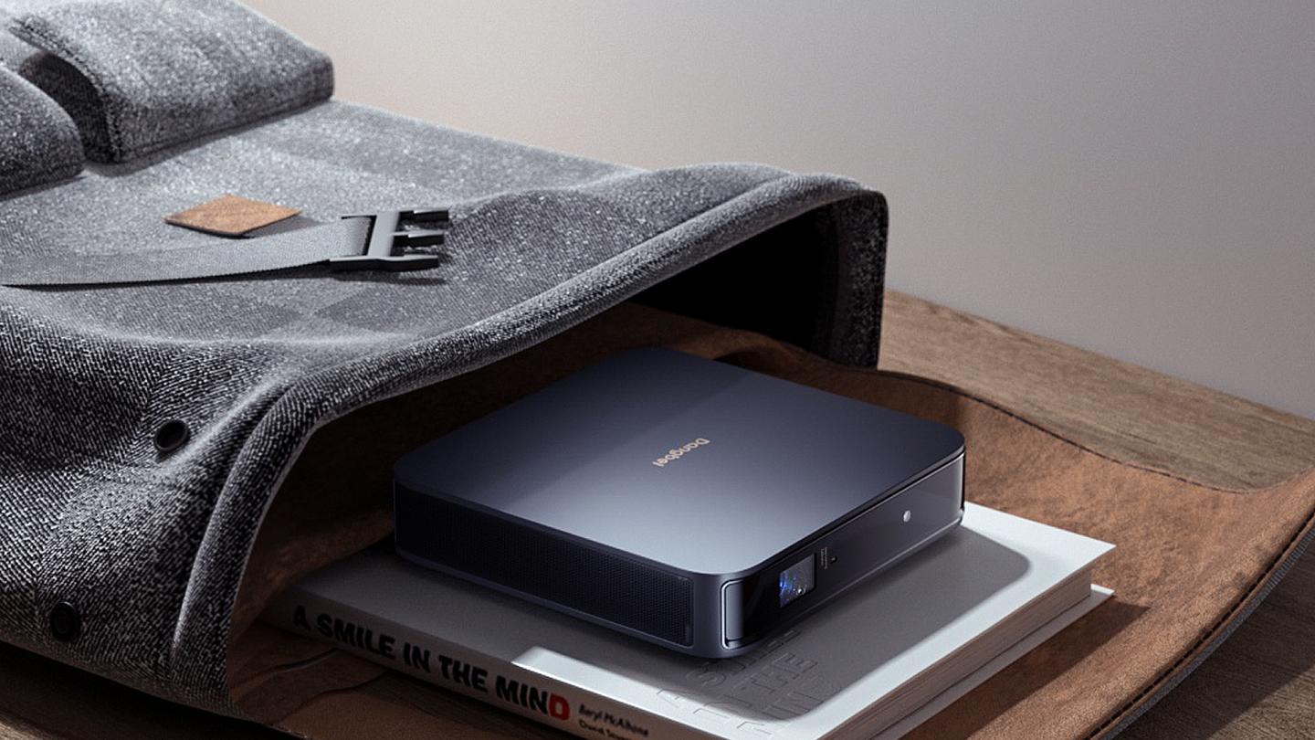 The projector measures 7.68 x 7.68 x 1.87 inches, and weighs in at 2.82 pounds