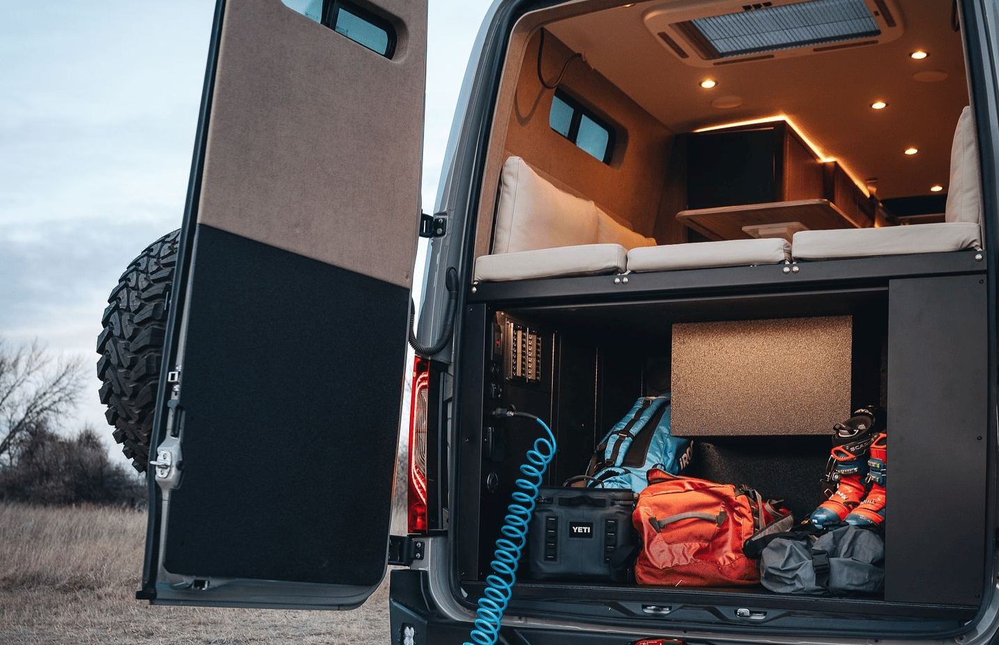 Similar to the more common raised rear bed, the raised lounge frees up garage space below
