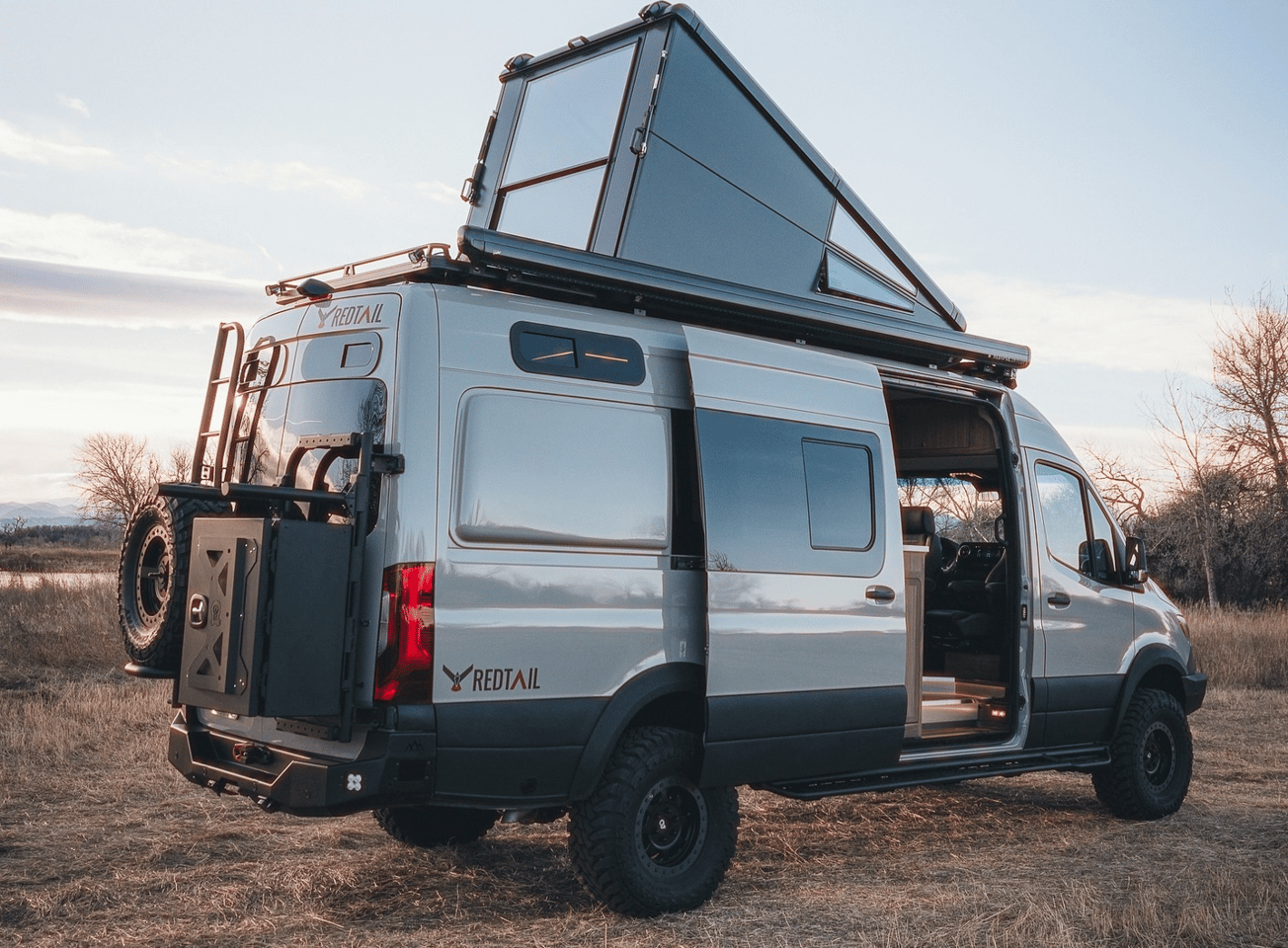 Taking a break from selling hard-sided rooftop campers for $20K+ a pop, Colorado's Redtail Overland has designed a meticulously specced $530,000 camper van with integrated hard-sided roof camper