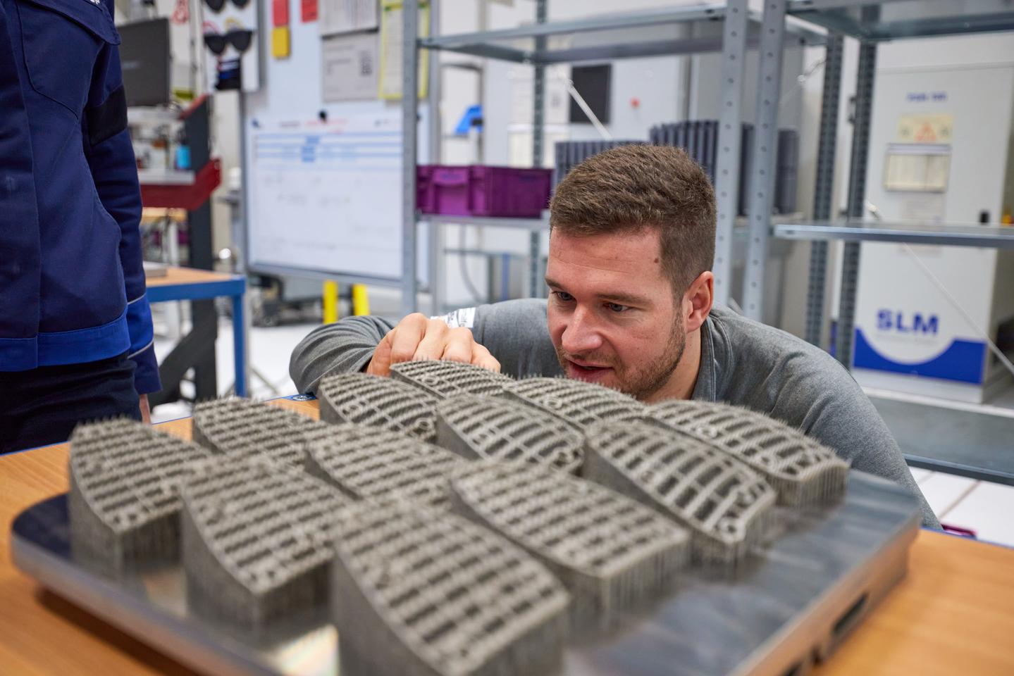 BMW Group are producing customized spike plates using advanced 3D printing technology