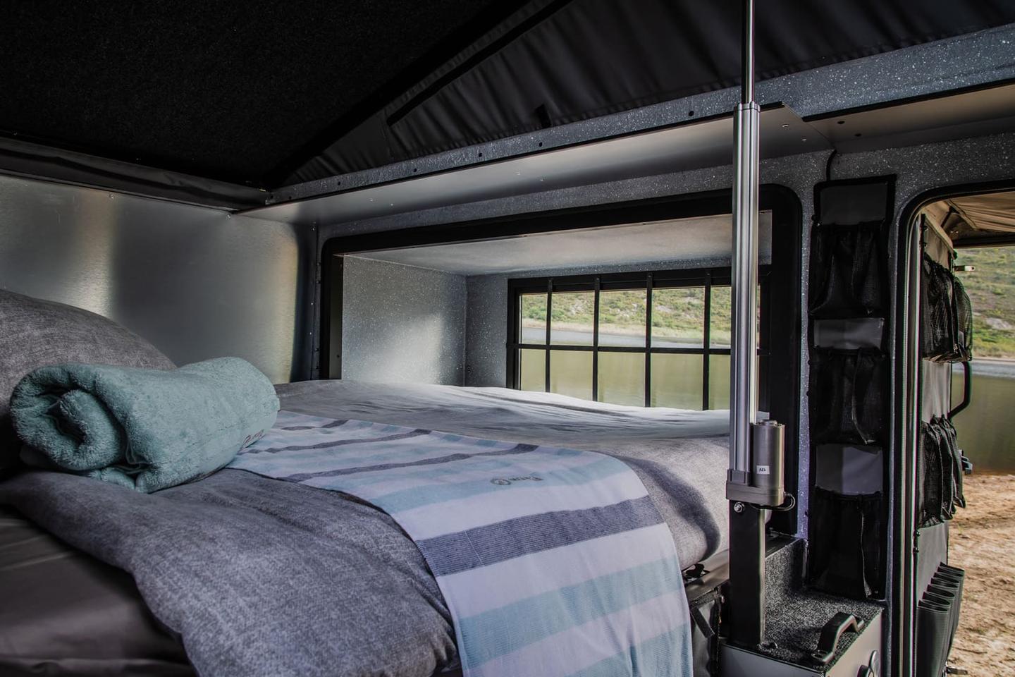 Inside, the Inkunzi has a double bed that folds out as the expansion slides
