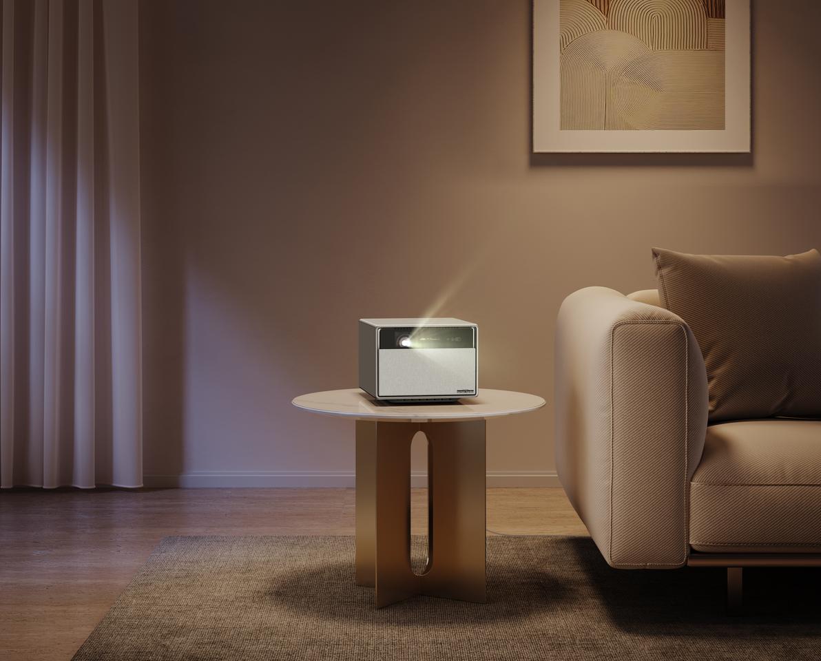 When powered on, the Horizon Ultra 4K smart projector's fabric grille lowers to reveal the projection engine