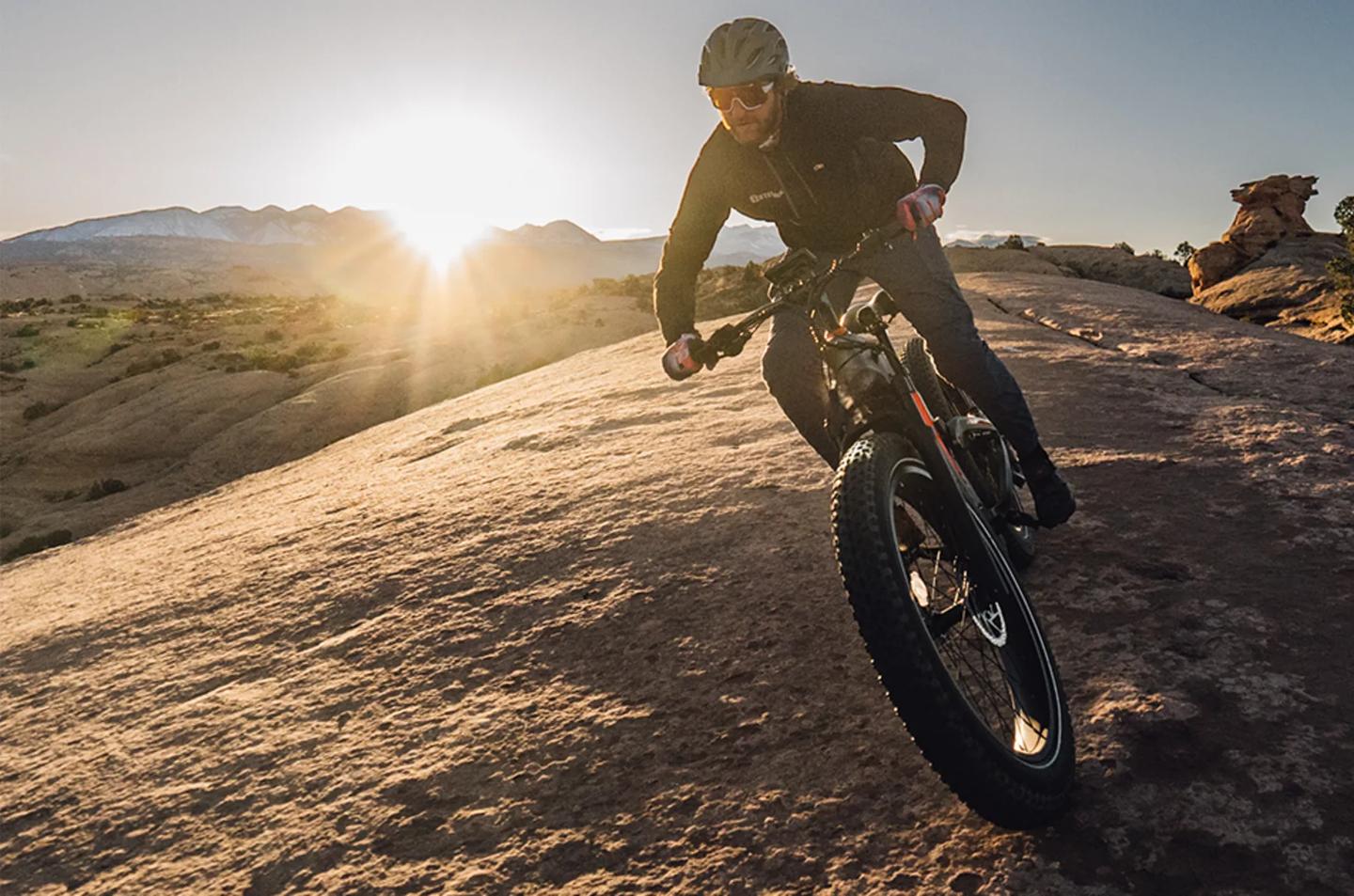 The Hero rolls on 26-inch wheels wearing "traction-enhanced" fat tires