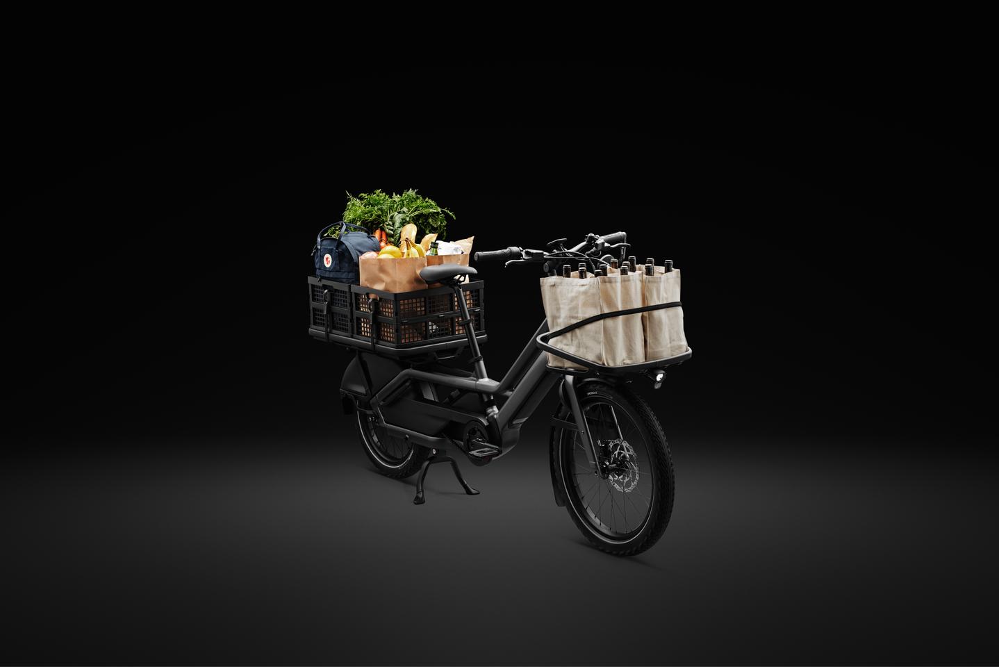 The Porto is designed to haul a couple of kids, but its long-tail rear rack and included front rack can carry up to 80 kg of cargo between them
