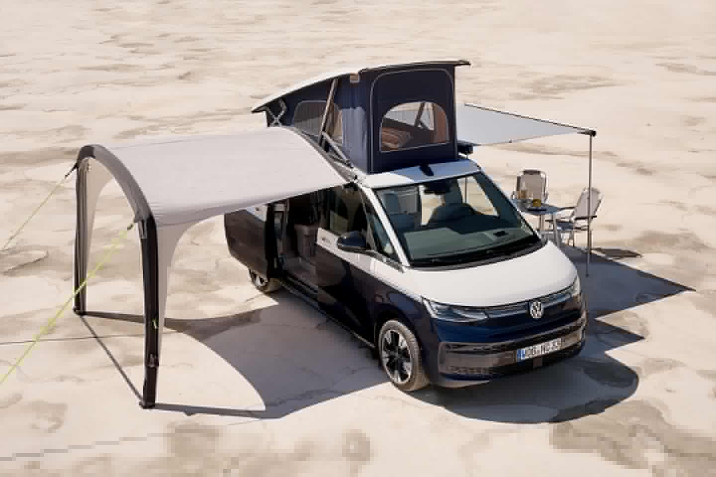 VW California buyers can order the pull-out awning on either side and use something like the pictured sunshade on the other side, creating two separate outdoor living areas from one van