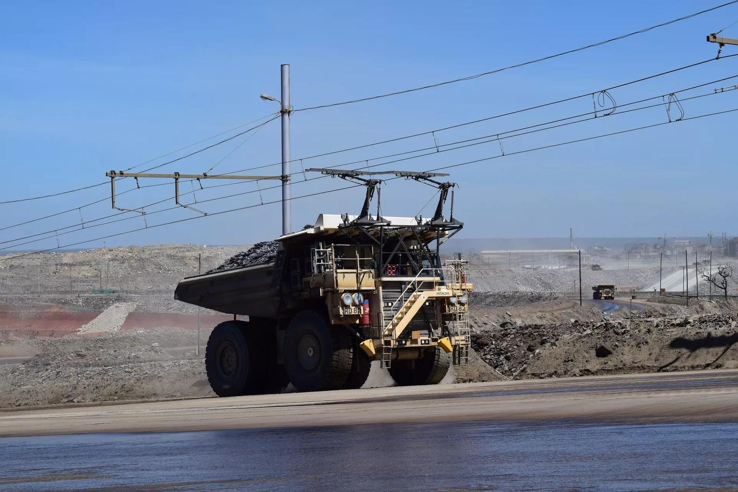The First Quantum mine in Zambia already employs dozens of Hitachi diesel-electric trolley trucks, and the battery prototype will take advantage of the existing network of overhead charging lines