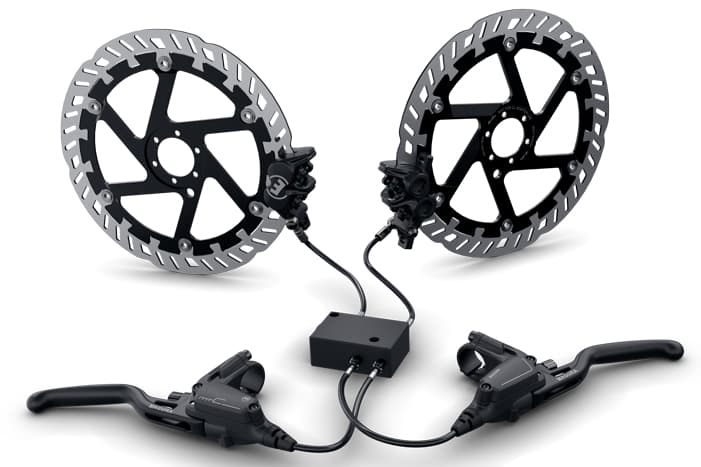 The IBS module is located between the brake levers and pistons
