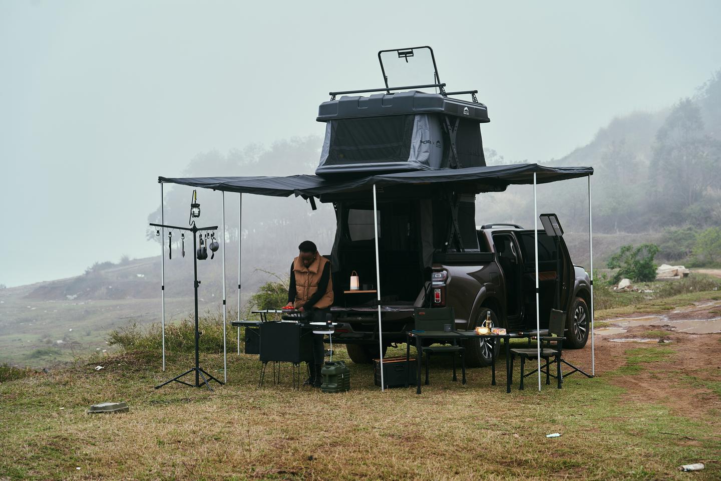 The Kitchen Cruiser makes the perfect companion to a pickup camping topper like Wild Land's own double-lift Safari Cruiser