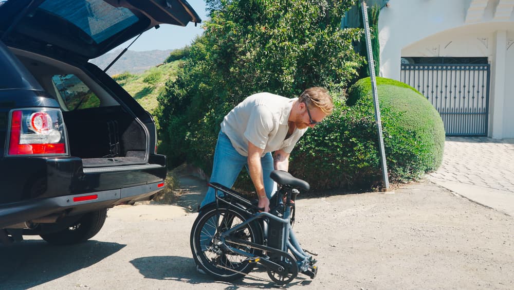 The ebike folds down to 36 x 21 x 29 inches for stowing under an office desk or popping in the trunk of a car