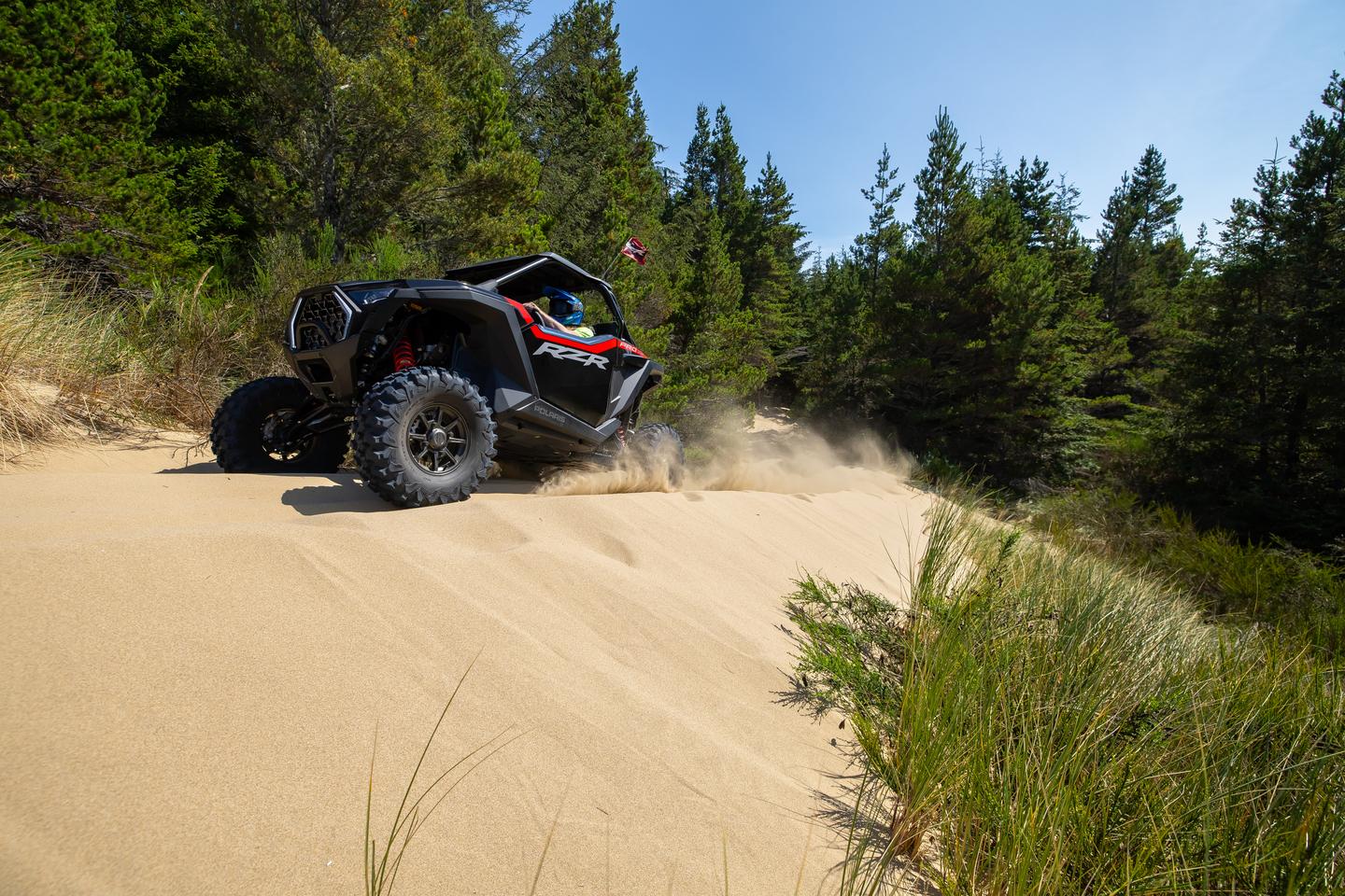 Pressing the suspension button to dig in is great during deep sand maneuvers like this