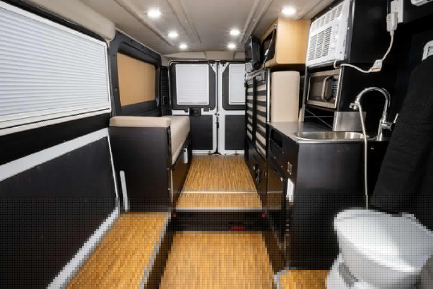 Between the expanded sidewall and foldaway