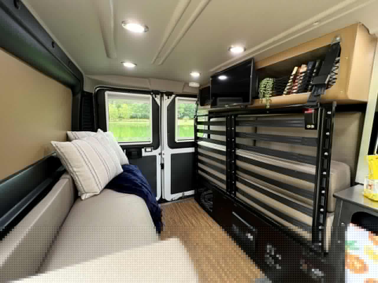 The foldaway bed clears the day lounge and dining area