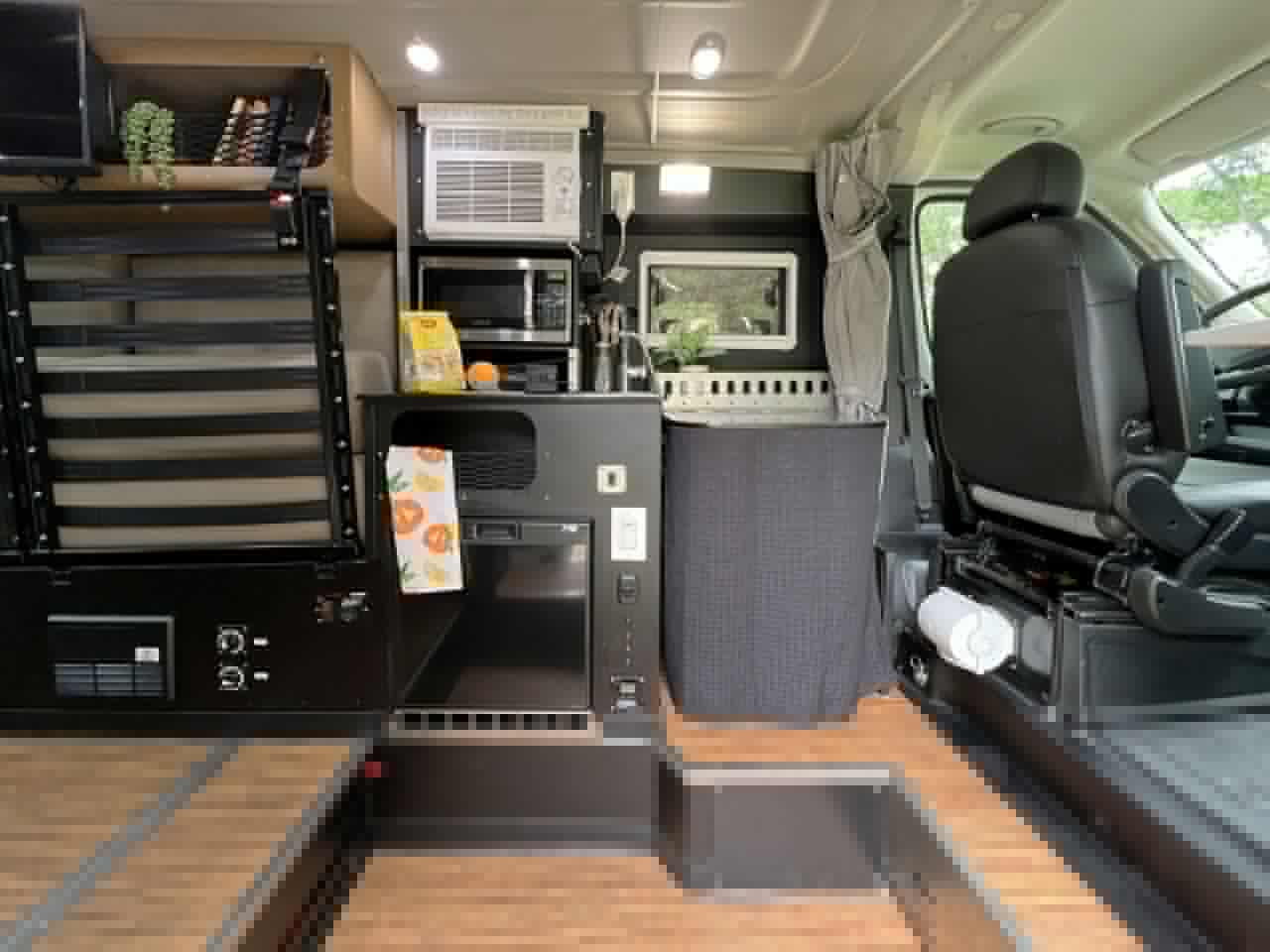 The Maxvan Access kitchen and shower benefit from the sunken floor area that creates a standing height over 6 feet