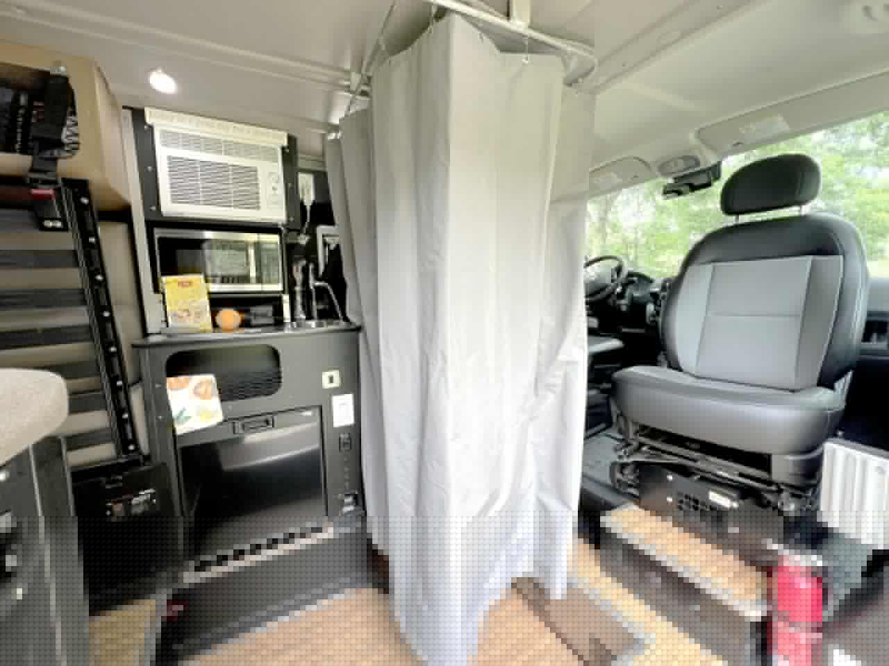 The shower curtain creates a private bathroom space