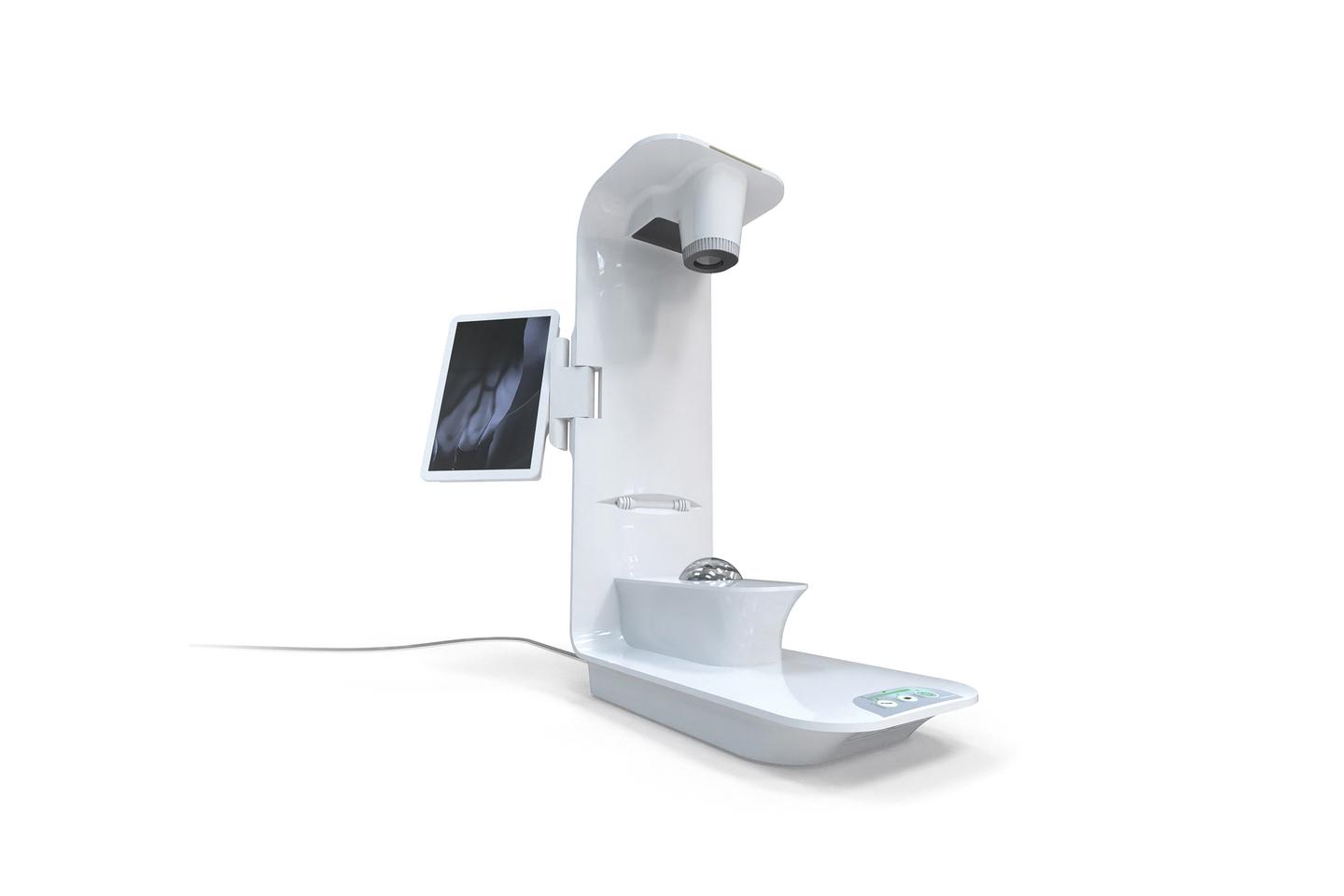 Patients place their hand on the sphere and a 3D map of their veins appears on the display screen