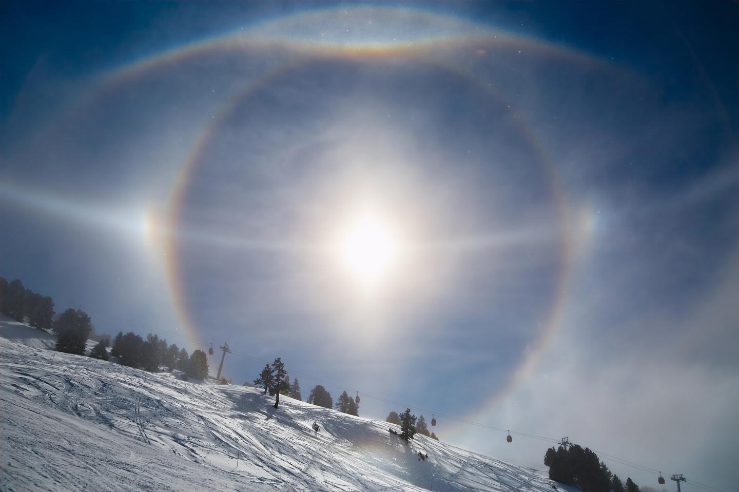 These dancing snowflakes play a role in how atmospheric phenomena like ice halos form