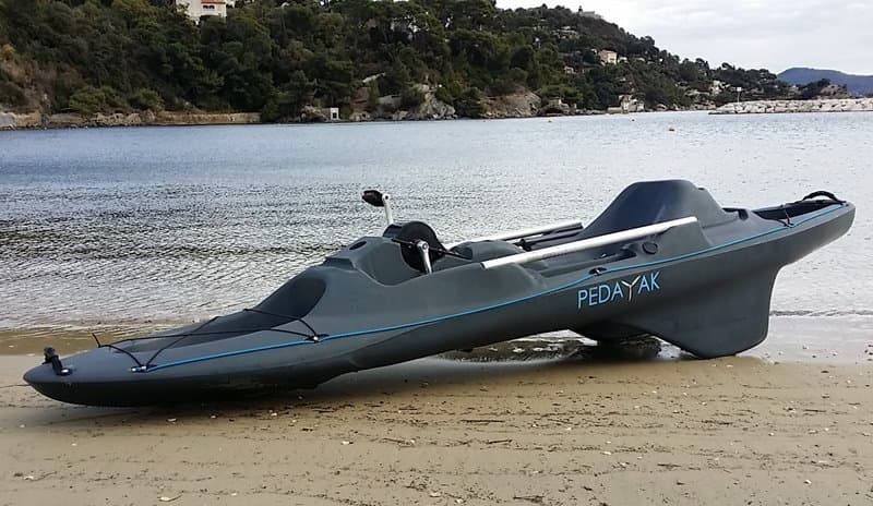 Side fins at the stern of the kayak protect the propellers when the boat is beached, as seen in this photo of the non-electric base-model Pedayak